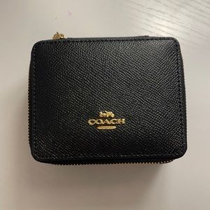 Coach jewelry travel case.